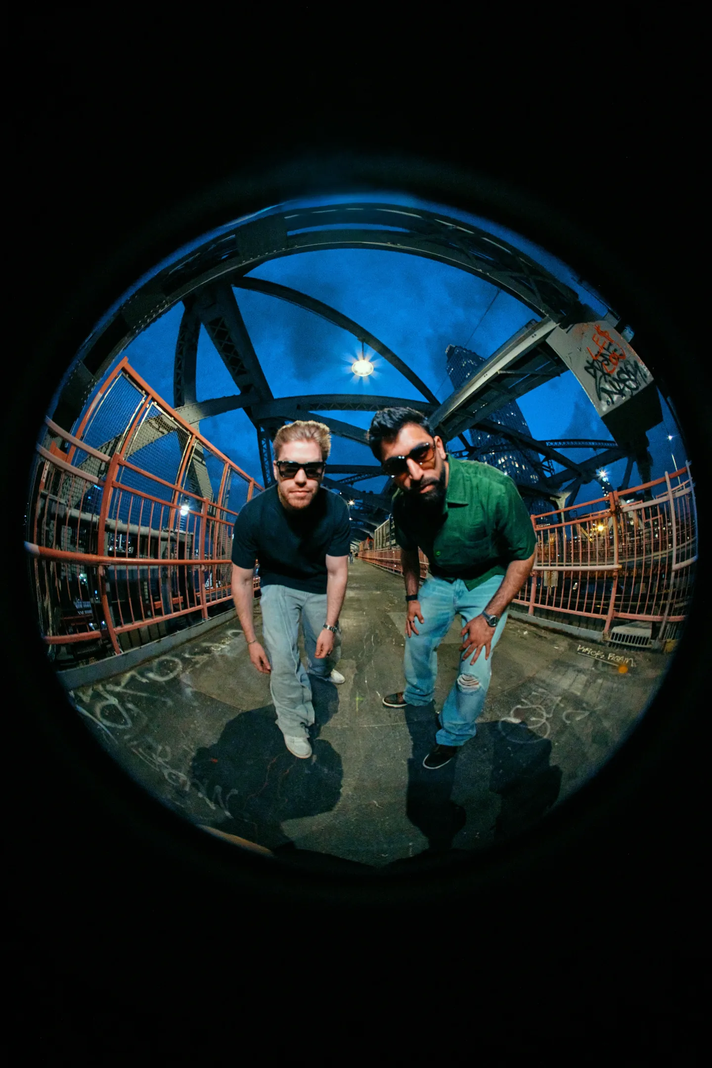 After Ours photographed through a fisheye lens on the Williamsburg Bridge