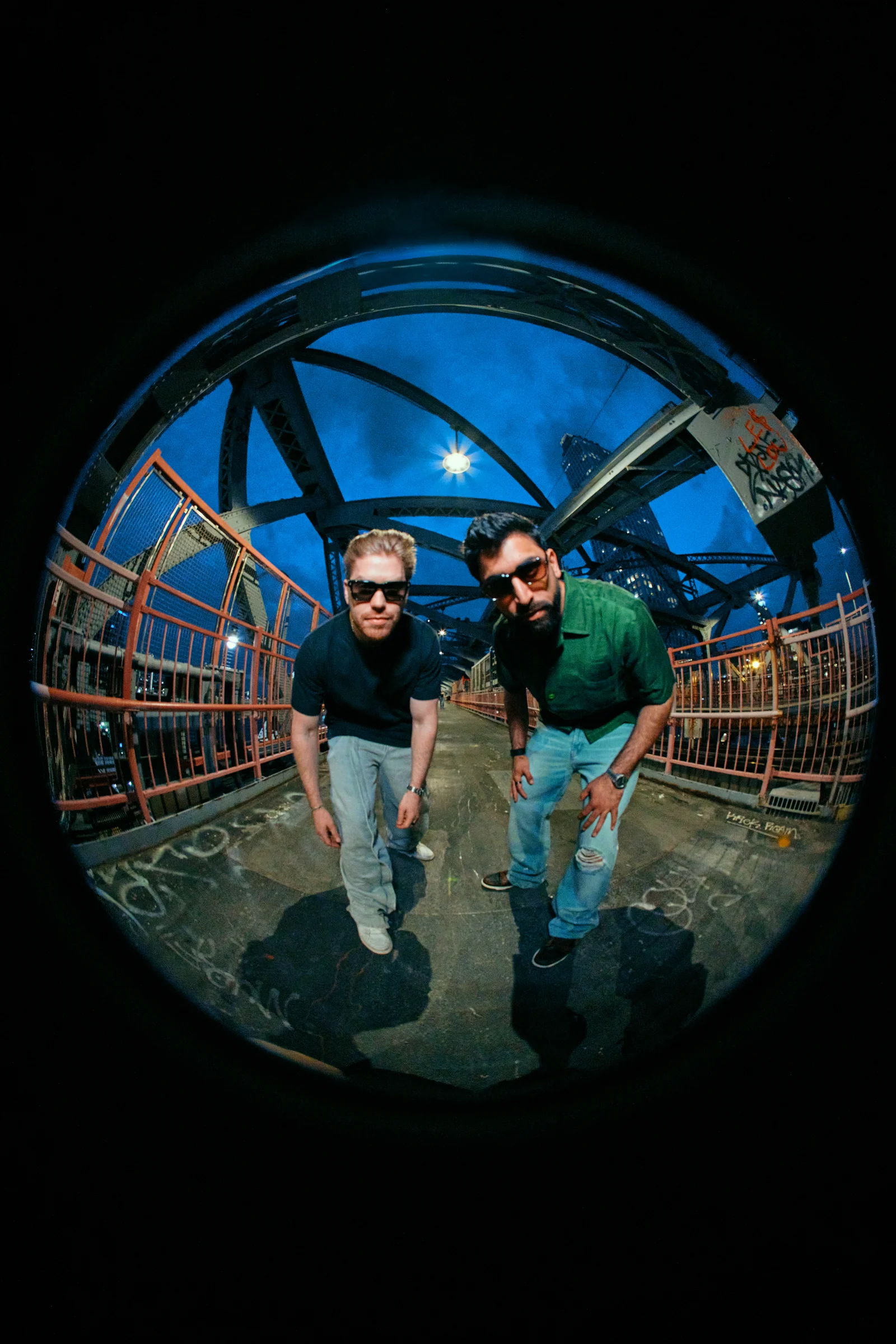 After Ours photographed through a fisheye lens on the Williamsburg Bridge